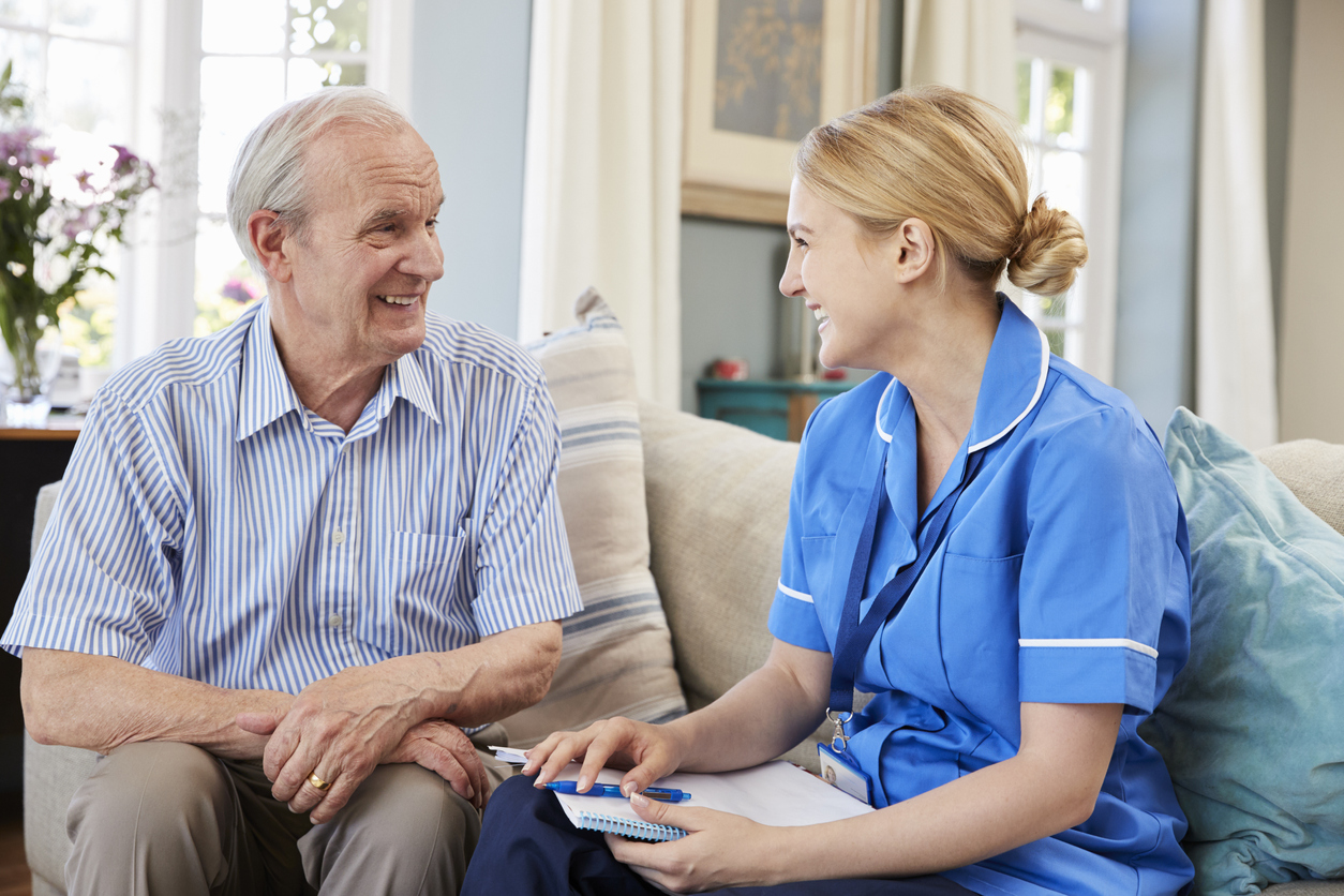 Friendly nursing staff assisting a resident at Vista Ridge Nursing, Lewisville, TX